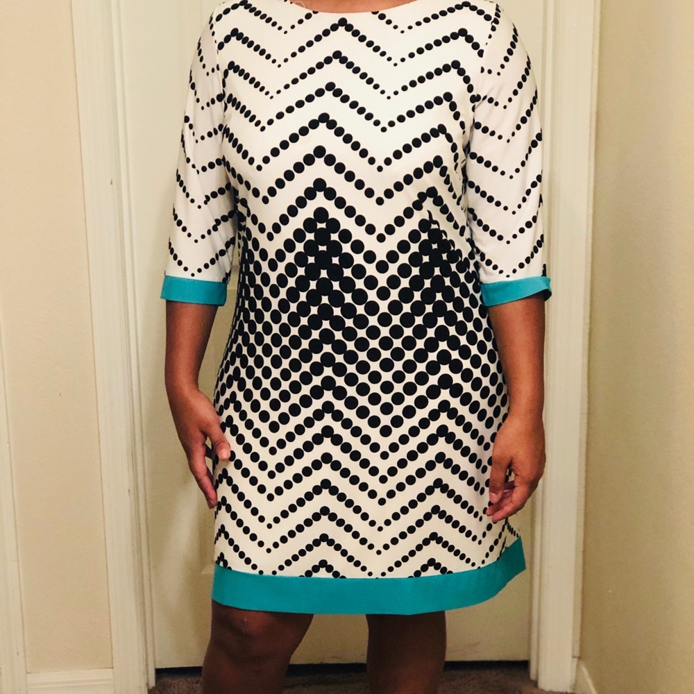 Black and white polka dot dress with teal accents